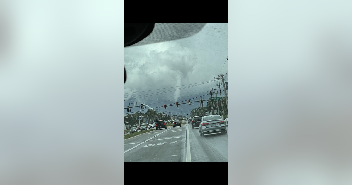 Tropical funnel cloud forms in Melbourne
