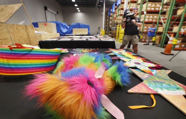 A colorful teddy bear is among artifacts and items collected after the Pulse tragedy. Those items are pictured at a climate-controlled warehouse in Orlando on Tuesday, June 2, 2026. Pulse artifacts that have been carefully removed from the site, packaged for preservation and stored in custom crates, may soon be used for later display as part of the Pulse Memorial. (Stephen M. Dowell/Orlando Sentinel)