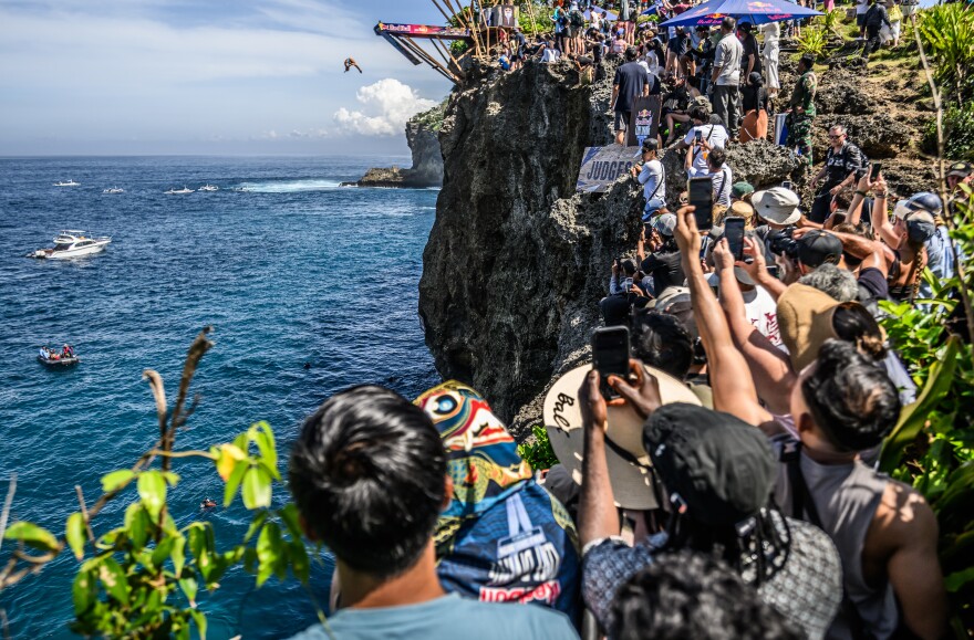 Lisa Faulkner of the USA dives from the 22 metre platform at Broken Beach during the final competition day of the first stop of the Red Bull Cliff Diving World Series in Bali, Indonesia on May 23, 2026.