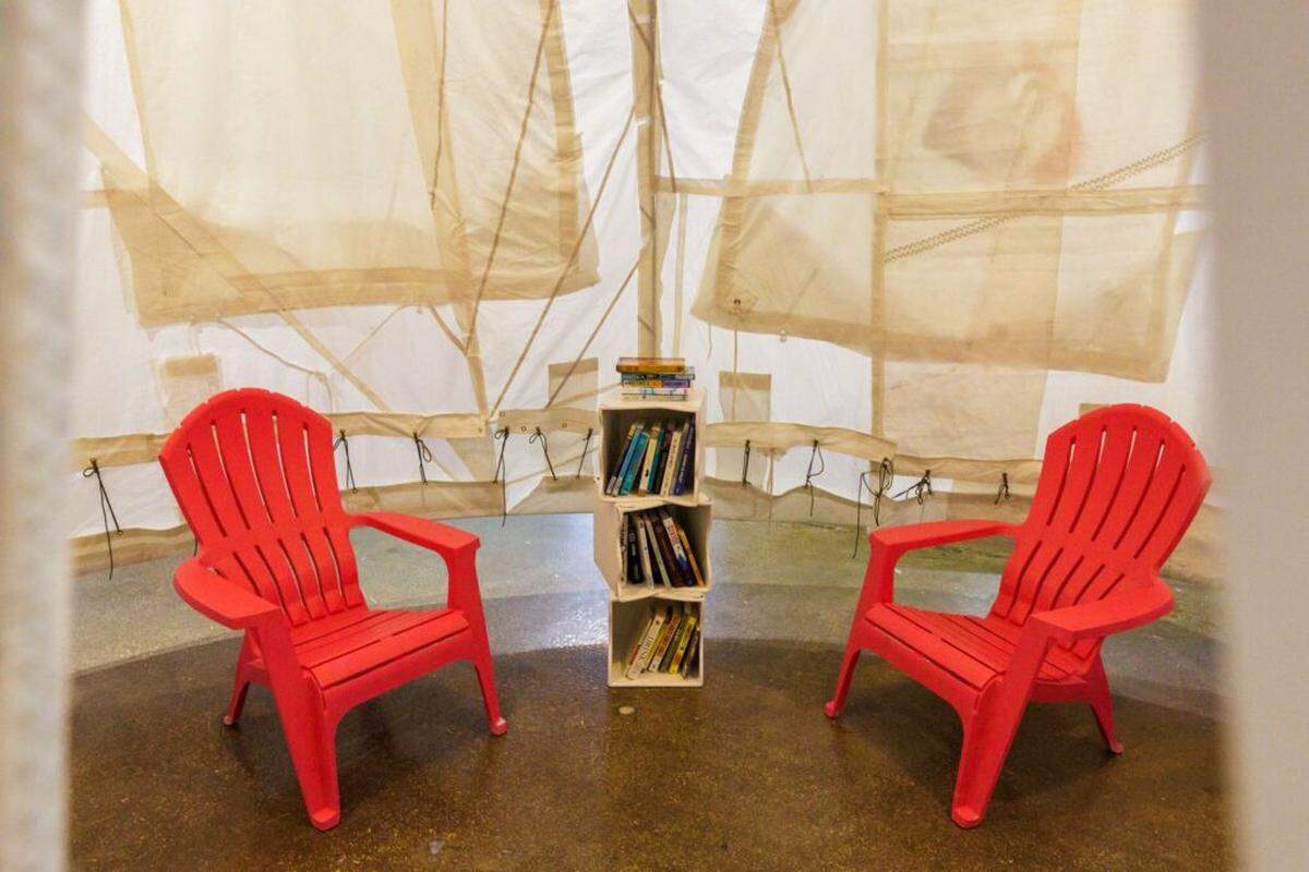 Visitors can enter through the fly of the giant cargo shorts, then take in books in the James William Buffett Anticolonialist Memorial Library.
