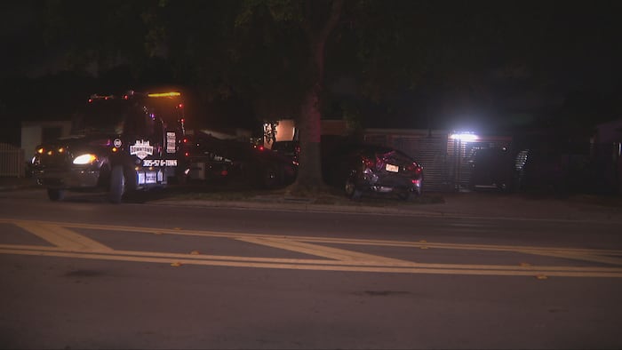 Driver hospitalized after crash sends car into home near Design District