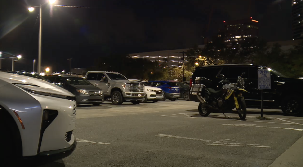 A grandfather is speaking out, claiming his granddaughter paid to park at a downtown Tampa lot and still had her car towed.