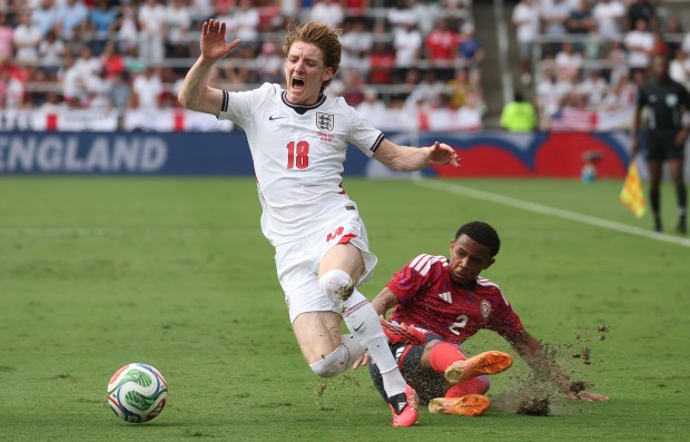 England player Anthony Gordon (18) is fouled by Costa Rica player Shawn Johnson Edwards (2) during the England versus Costa Rica pre-World Cup friendly match at Inter&Co Stadium in Orlando, Florida, on Wednesday, June 10, 2026. (Stephen M. Dowell/Orlando Sentinel)