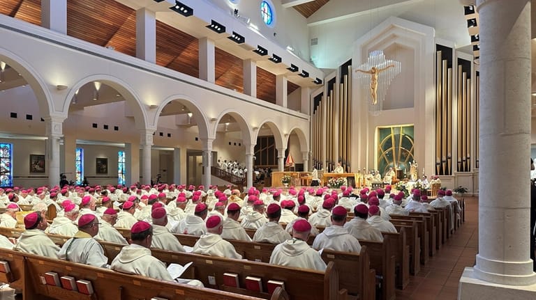 U.S. Catholic bishops are seated at the Basilica of the...