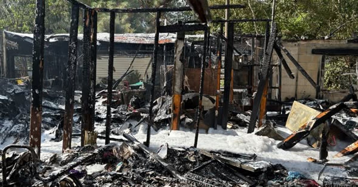 Crews battle heavy fire at Orange County home, officials say