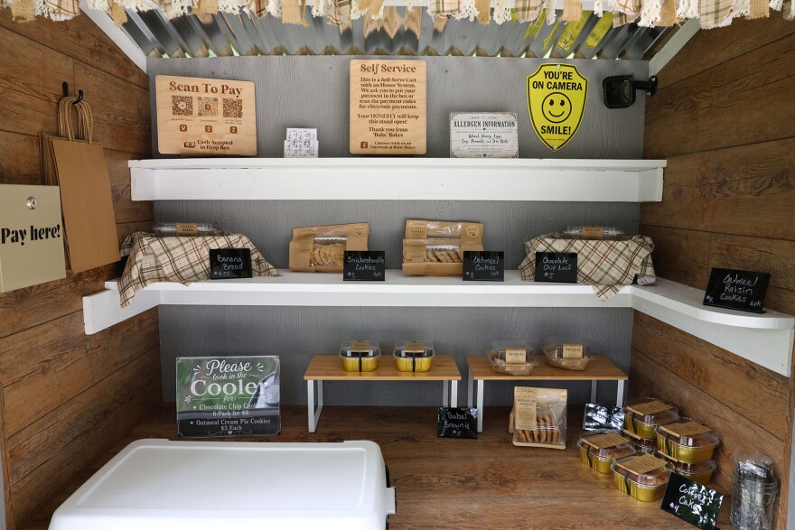 The Bolte Bakes farm stand houses homemade treats and a cooler to combat the Florida heat in Ocala, Fla., on Monday, June 8, 2026. (Kaley Mantz/WUFT News)