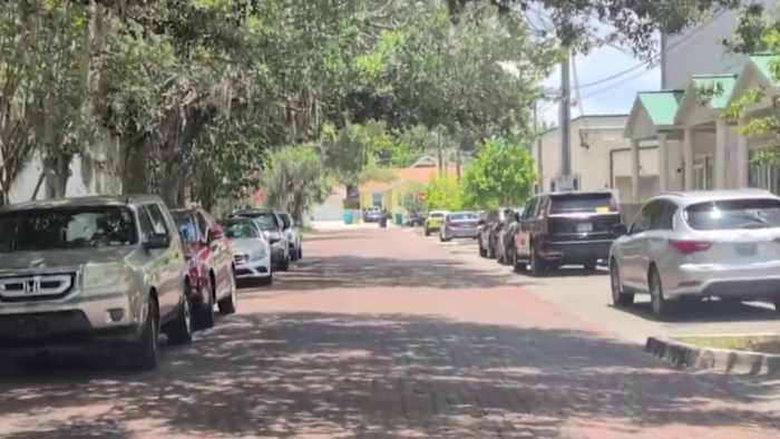 Proposed Mills 50 parking garage sparks debate over parking needs and business displacement