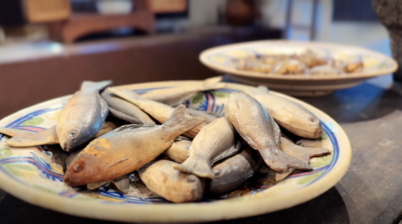 A plate of whole fish.