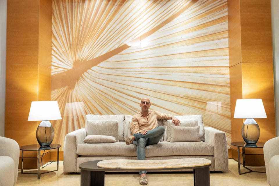 Alex Turco in front of his installation at Acqualina.