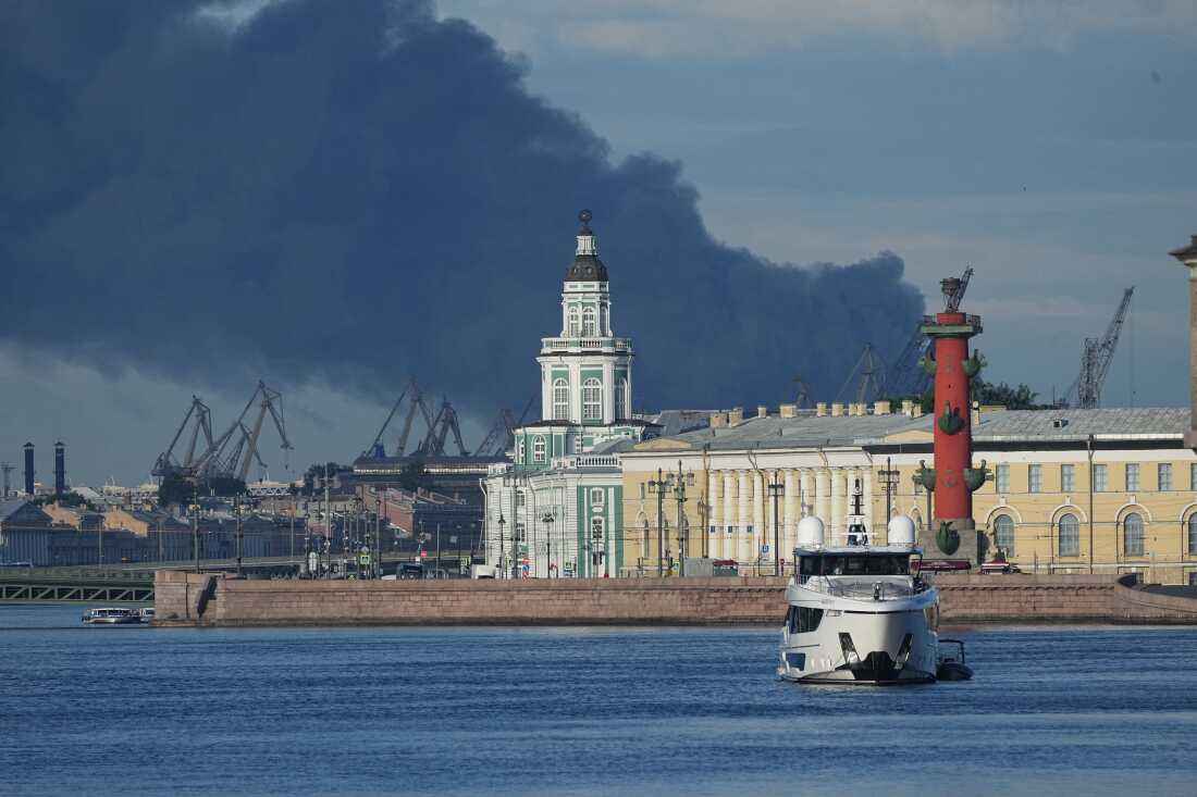 A plumes of black smoke is seen over the port of St. Petersburg, Russia, Wednesday, June 3, 2026, after a Ukrainian drone attack.