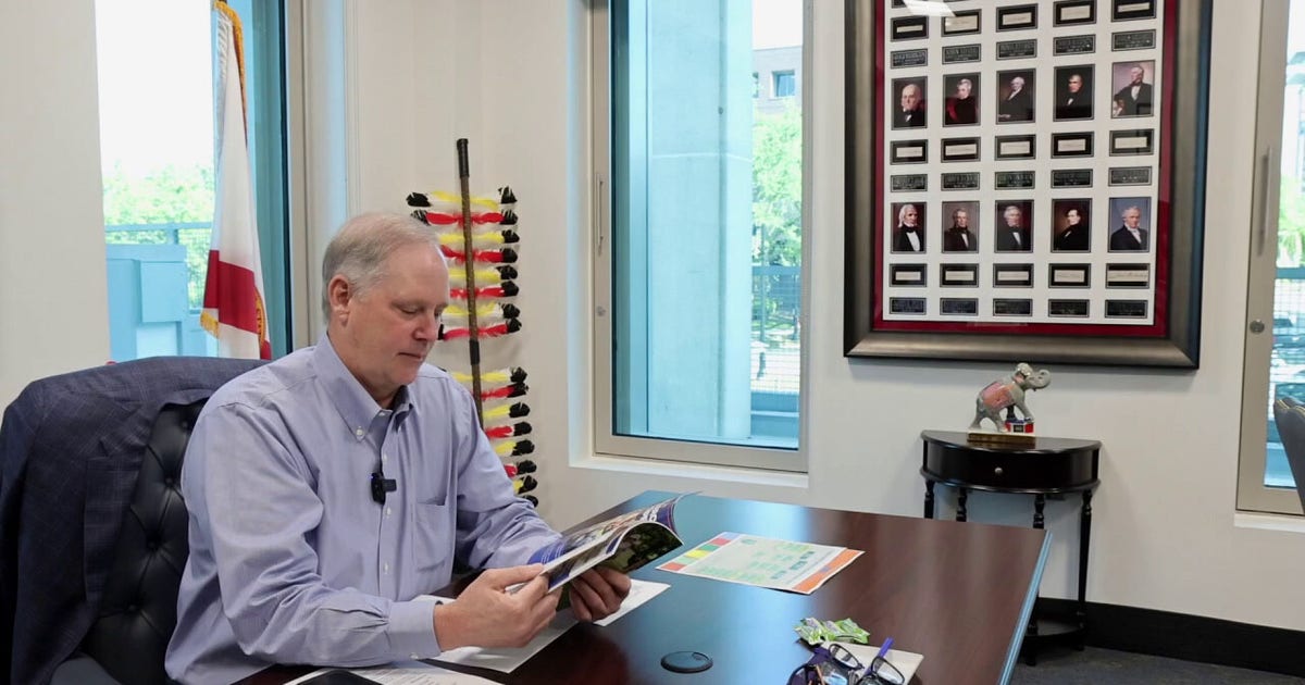 Florida Agriculture Commissioner Wilton Simpson displays every presidential signature in Capitol office