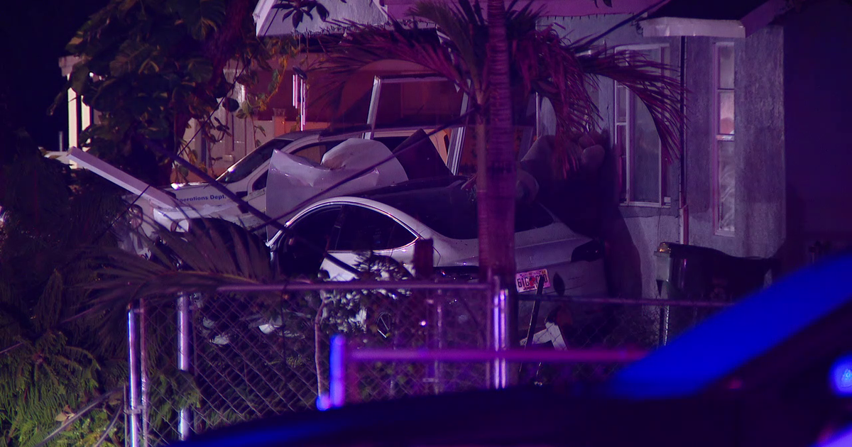 Tesla crashes into porch of North Tampa home; TECO responds to downed power line: Police