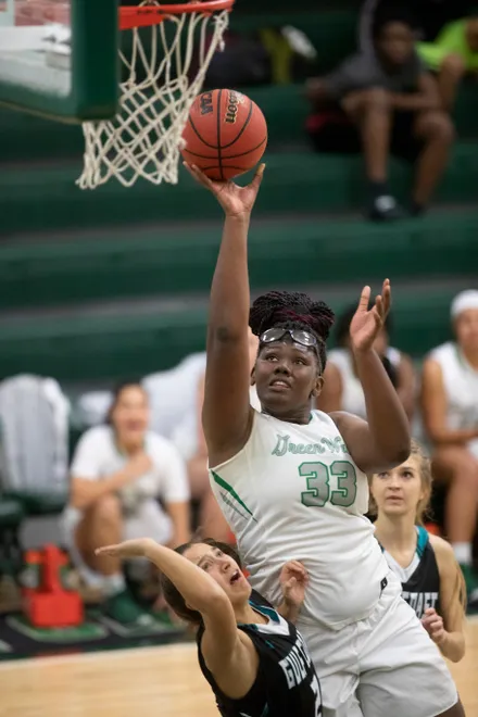 Fort Myers High School's Chaniya Clark scores against Gulf Coast on Thursday (1/10/19) in Fort Myers.