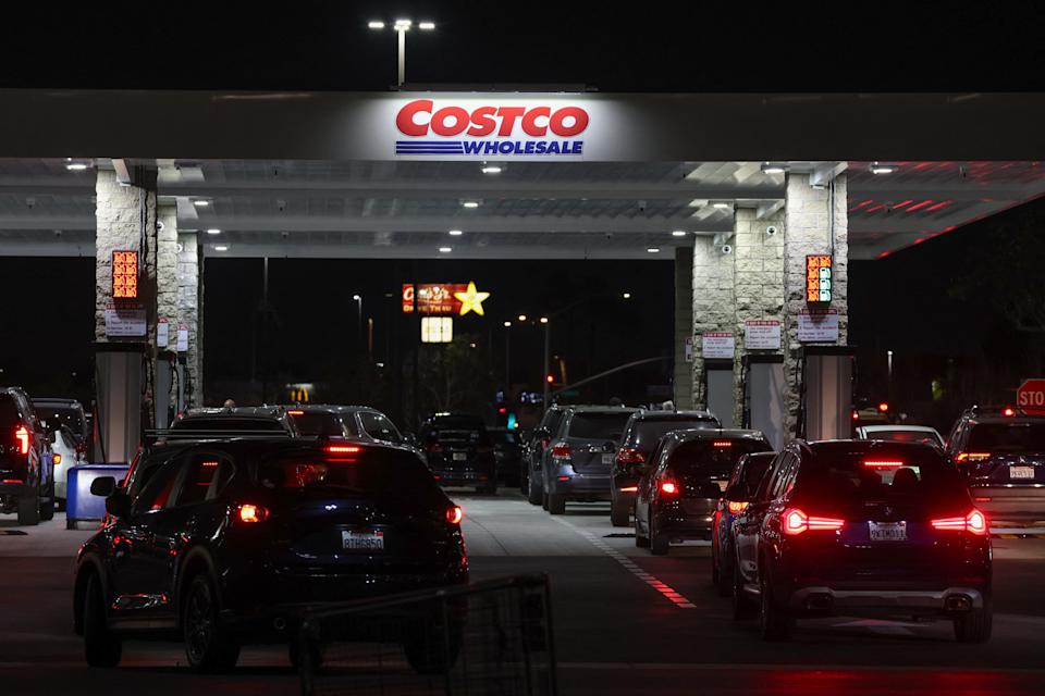 Drivers wait in their vehicles to pump gasoline at a Costco gas station in Hawthorne, California on March 18, 2026.
