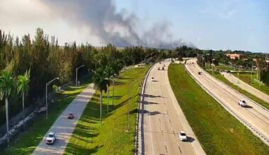 Smoke plume over Sawgrass Expressway as Broward brush fire burns