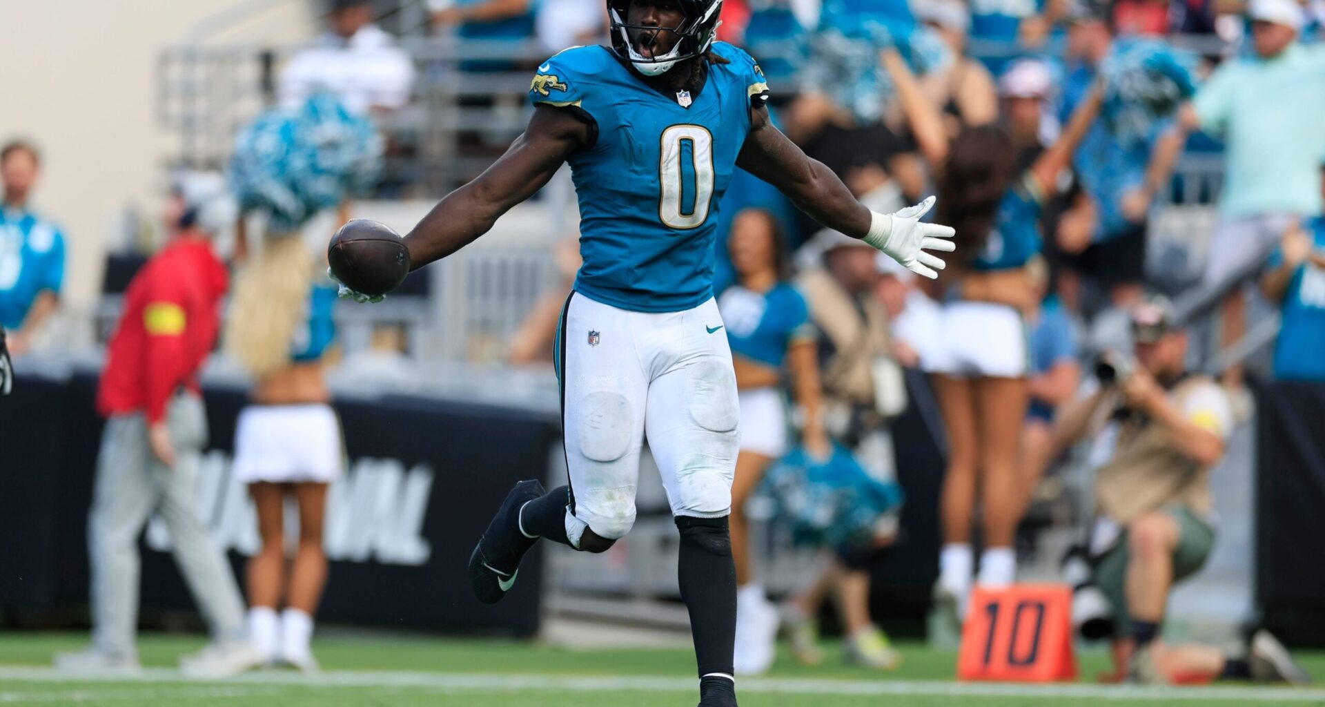 Jacksonville Jaguars linebacker Devin Lloyd (0) reacts to his fumble recovery during the fourth quarter of an NFL football matchup at EverBank Stadium, Sunday, Sept. 21, 2025, in Jacksonville, Fla. The Jaguars defeated the Texans 17-10.