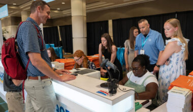 BCM students serve behind scenes in Orlando, set registration records