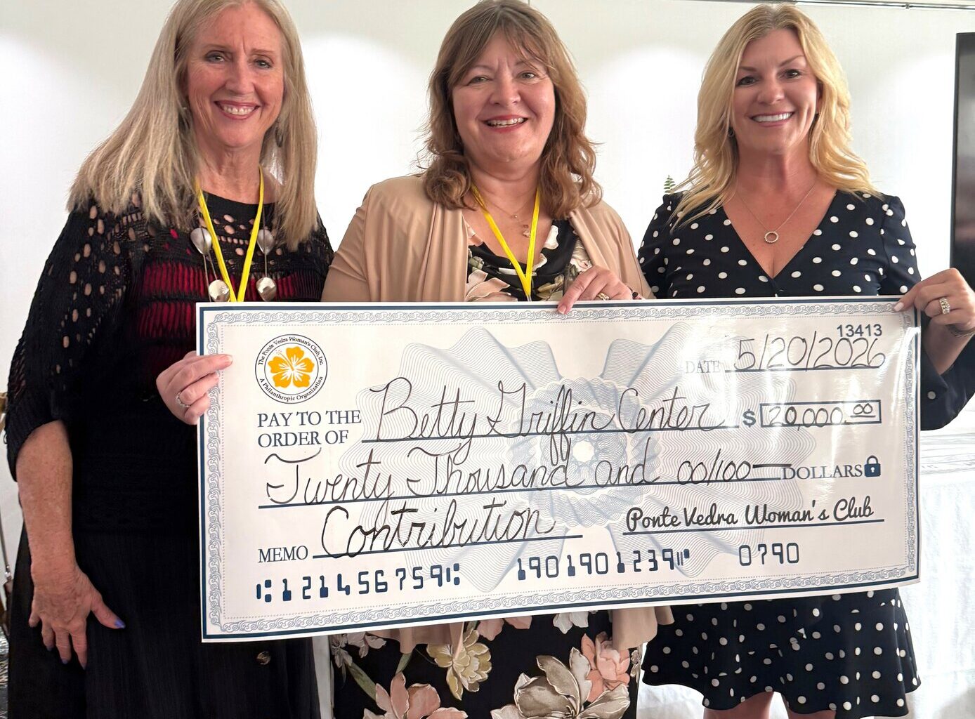 A $20,000 donation to the Betty Griffin Center was accepted by CEO Kelly Franklin.