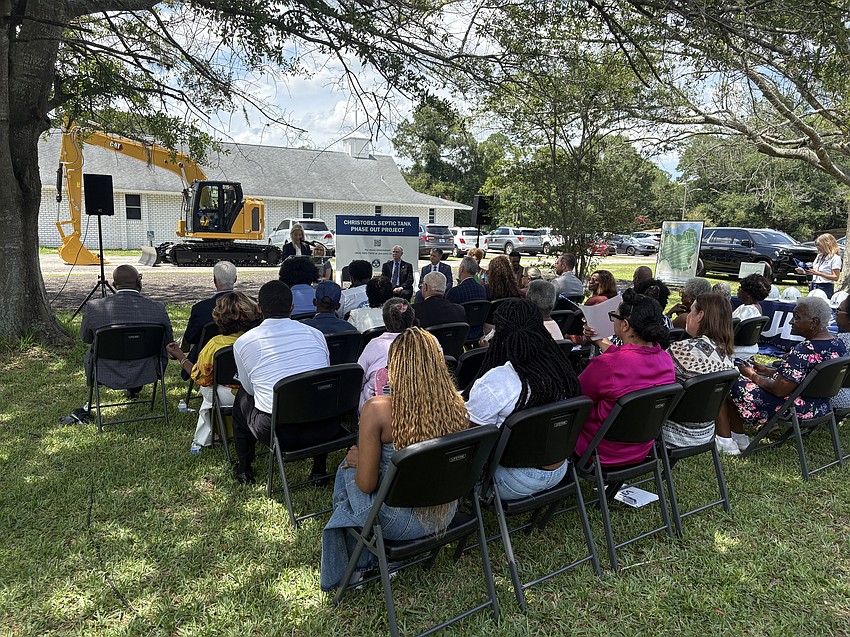Mayor Donna Deegan speaks to a small crowd about the city’s septic tank phase-out project in the Christobel neighborhood.