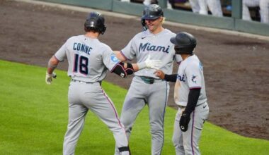Lopez, Conine power Marlins to 10-7 win