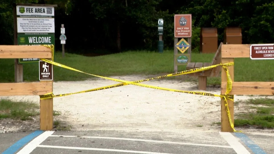 The entrance to Barr Street Trailhead was closed after a woman from Orlando was attacked by an alligator at Little Big Econ State Forest. - WESH