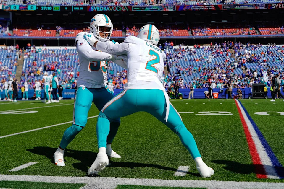 <span class="wp-block-image__caption-text">Oct 1, 2023; Orchard Park, New York, USA; Miami Dolphins defensive tackle Da’Shawn Hand (93) and Miami Dolphins linebacker Bradley Chubb (2) warm up prior to the game against the Buffalo Bills at Highmark Stadium. Mandatory Credit: Gregory Fisher-USA TODAY Sports</span>