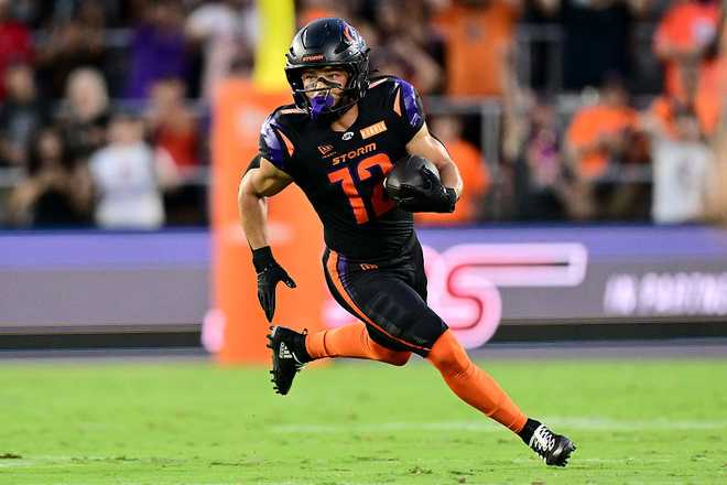 DC Defenders v Orlando Storm ORLANDO, FLORIDA - MAY 22: Chris Rowland #12 of the Orlando Storm carries the ball for a touchdown against the DC Defenders during the first quarter at Inter&Co Stadium on May 22, 2026 in Orlando, Florida. (Photo by Julio Aguilar/UFL/Getty Images)