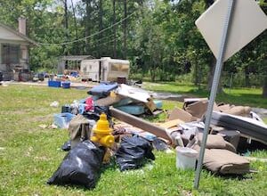 Neighbors demand action after homeowner’s death turns Jacksonville property into open-air dump