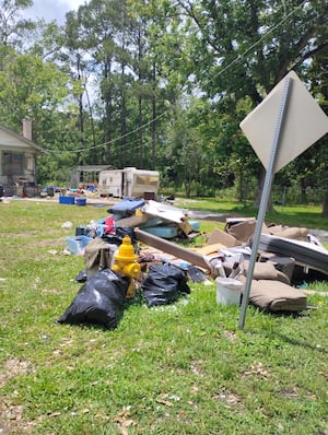 Neighbors demand action after homeowner’s death turns Jacksonville property into open-air dump