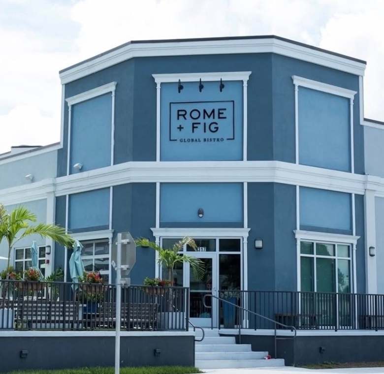 Exterior view of Rome + Fig Global Bistro restaurant building and outdoor patio seating