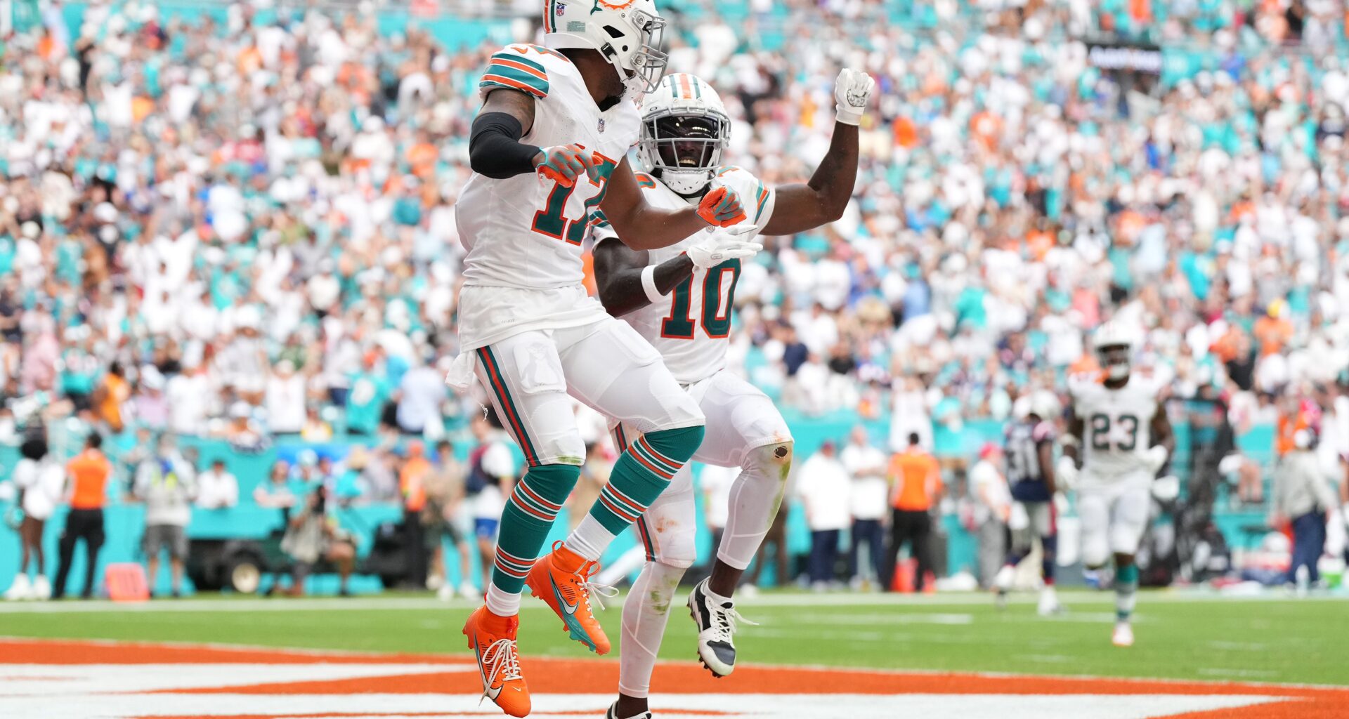Oct 29, 2023; Miami Gardens, Florida, USA; Miami Dolphins wide receiver Jaylen Waddle (17) celebrates his touchdown against the New England Patriots with wide receiver Tyreek Hill (10) during the second half at Hard Rock Stadium.