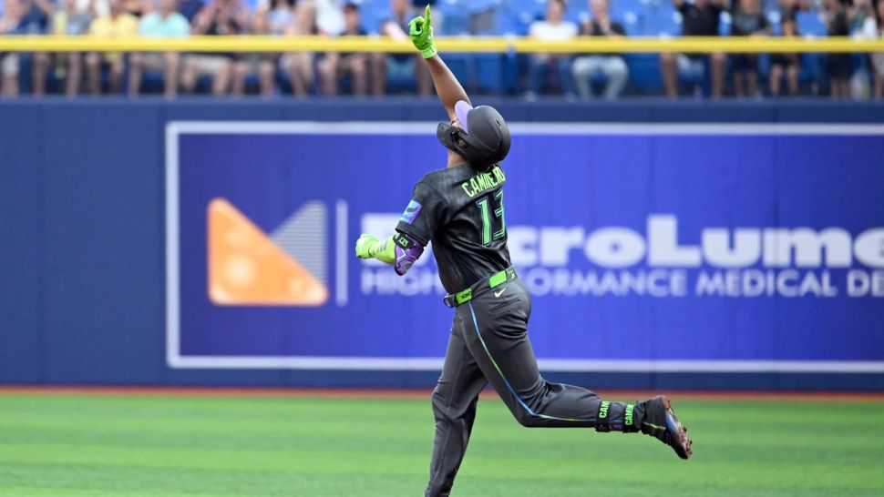 Tampa Bay Rays' Junior Caminero rounds the bases after his home run during the first inning of a baseball game against the Arizona Diamondbacks Saturday, June 27, 2026, in St. Petersburg, Fla. (AP Photo/Jason Behnken)