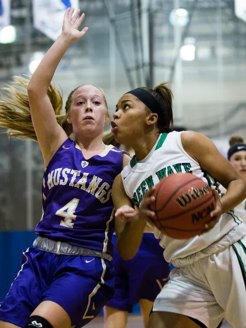 Fort Myers High School senior, Jarya Outten, shoots a layup during game 6 of the Naples Holiday Shootout at Community School of Naples in East Naples on Wednesday, December 28, 2016. Fort Myers lost to Central Arkansas Christian High School.