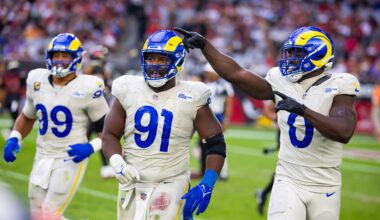 Nov 26, 2023; Glendale, Arizona, USA; Los Angeles Rams defensive tackle Kobie Turner (91) with linebacker Byron Young (0) and defensive tackle Aaron Donald (99) against the Arizona Cardinals at State Farm Stadium. Mandatory Credit: Mark J. Rebilas-USA TODAY Sports