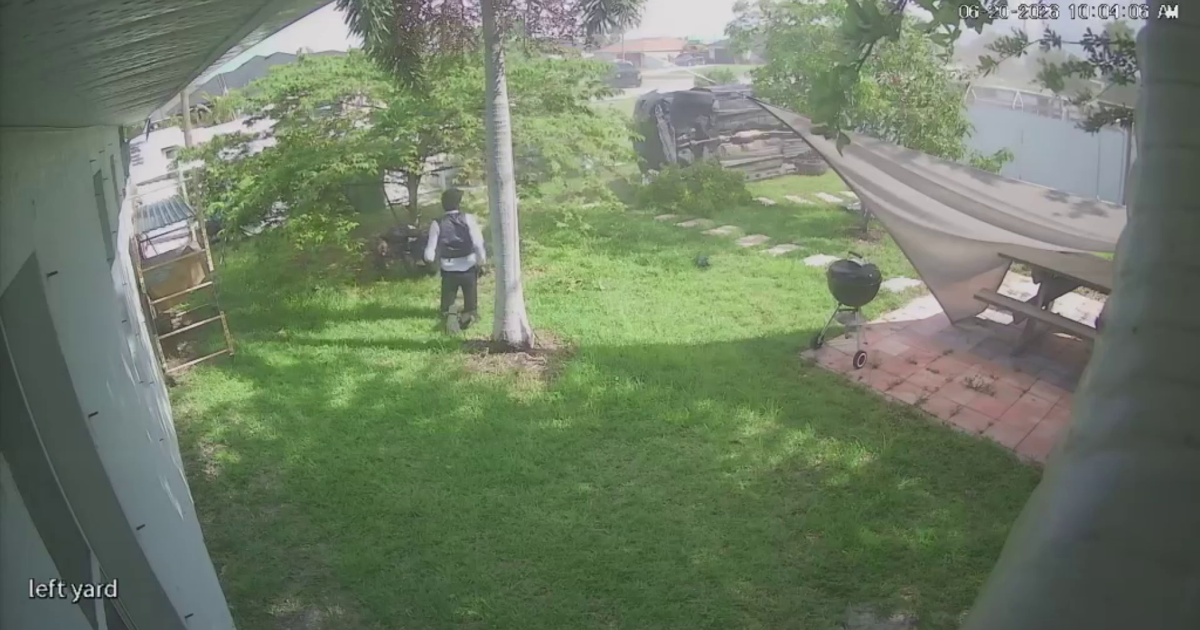 Security video captures car crashing into Cape Coral backyard, ejecting two men | Lee County