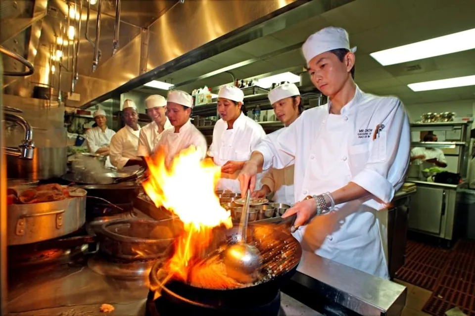 Chef Xiao Lei Shao cooks at Mr Chow at the W South Beach in July 2010.