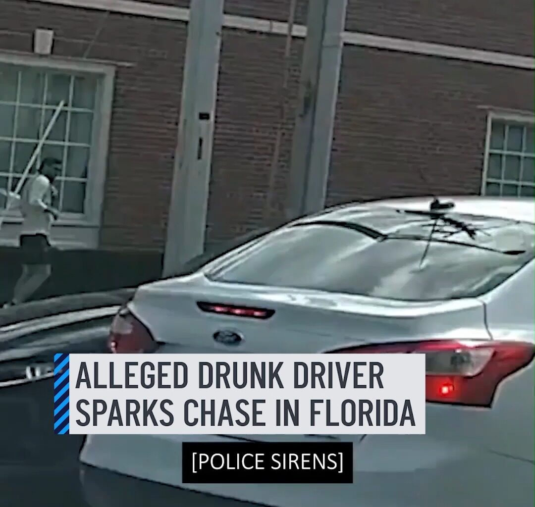 Authorities in Jacksonville, Florida, released video showing an allegedly drunk driver sparking a police chase on May 16. The suspect, 62-year-old Darrell Simon, drove onto the Ironman race course, endangering athletes, and sideswiped several vehicles before being stopped by police. No one was injured. #policechase #florida #police