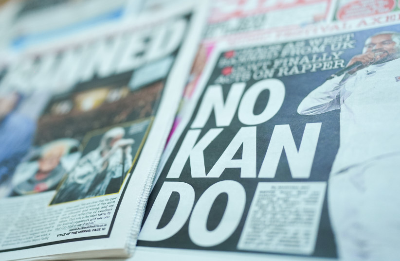 In this photo illustration, UK newspaper front pages and articles display stories and images of Kanye West after he was blocked by the government from entering the UK on April 8, 2026 in London, England.