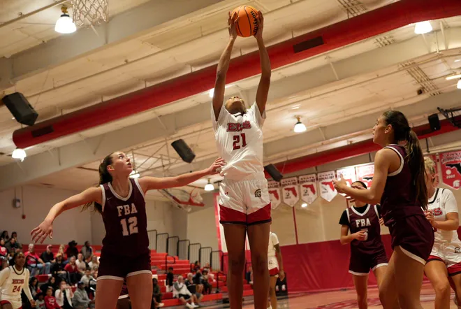 The Sentinels' Nalah Smith grabs a rebound in action from a girls basketball game between Evangelical Christian School and First Baptist Academy at ECS on Thursday, Dec. 5, 2024. ECS won 43-29.