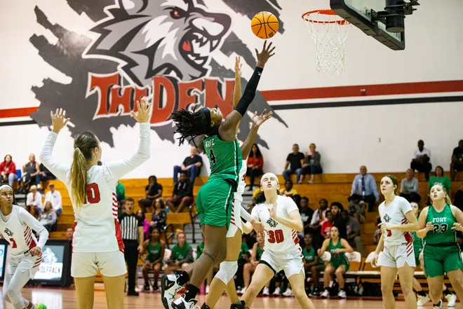Tyra Brown of tFort Myers drives to the basket against South Fort Myers during a playoff game against South Fort Myers. Fort Myers won.
