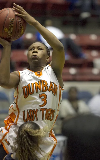 Dunbar High School's Keri Jewett (3) the go ahead game winning basket with 1.8 seconds to play against Coral Springs Charter School during their FHSAA Girls Basketball 4A semifinal game at the Lakeland Center Wednesday. Dunbar won the game 53-51. February 22, 2012. The Ledger/Michael Wilson