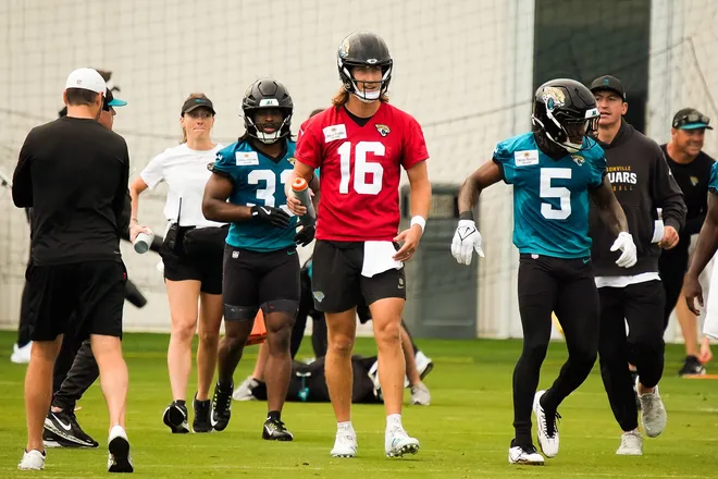 Jacksonville Jaguars quarterback Trevor Lawrence (16) walks to his next session during the second day of minicamp at the Miller Electric Center, Wednesday, June 10, 2026, in Jacksonville. [Doug Engle/Florida Times-Union]