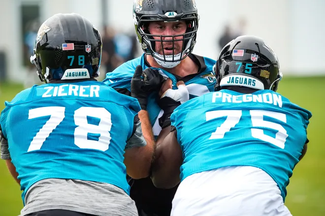 Jacksonville Jaguars offensive tackle Walker Little (72), center, works on drill with teammates offensive lineman Kilian Zierer (78) and Jacksonville Jaguars offensive tackle Emmanuel Pregnon (75) during the second day of minicamp at the Miller Electric Center, Wednesday, June 10, 2026, in Jacksonville. [Doug Engle/Florida Times-Union]