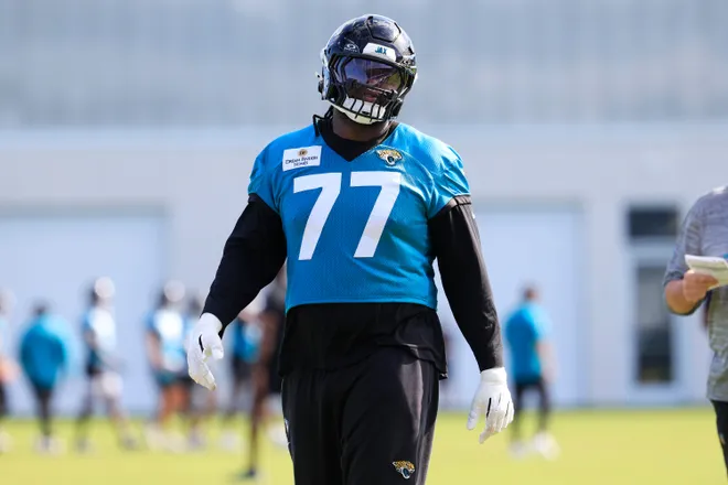 Jacksonville Jaguars offensive tackle Anton Harrison (77) looks on during the third day of minicamp at the Miller Electric Center, Thursday, June 11, 2026, in Jacksonville, Fla.