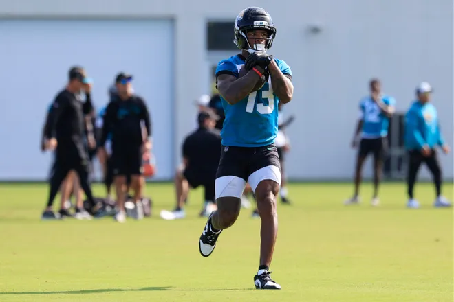 Jacksonville Jaguars wide receiver Tim Jones (13) runs the ball during the third day of minicamp at the Miller Electric Center, Thursday, June 11, 2026, in Jacksonville, Fla.