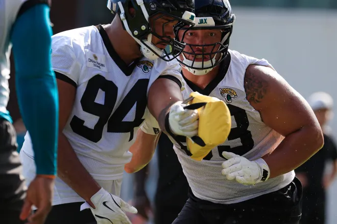 Jacksonville Jaguars defensive tackle Matt Dickerson (93), right, drills on defensive lineman T.J. Bollers (94) during the third day of minicamp at the Miller Electric Center, Thursday, June 11, 2026, in Jacksonville, Fla.