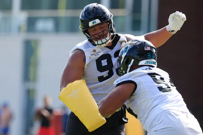 Jacksonville Jaguars defensive tackle Matt Dickerson (93) drills on defensive lineman T.J. Bollers (94) during the third day of minicamp at the Miller Electric Center, Thursday, June 11, 2026, in Jacksonville, Fla.