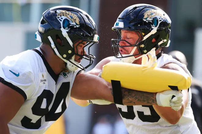 Jacksonville Jaguars defensive lineman T.J. Bollers (94), left, drills with defensive tackle Matt Dickerson (93) during the third day of minicamp at the Miller Electric Center, Thursday, June 11, 2026, in Jacksonville, Fla.