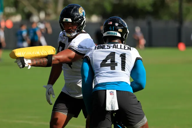 Jacksonville Jaguars defensive lineman T.J. Bollers (94) drills against defensive end Josh Hines-Allen (41) during the third day of minicamp at the Miller Electric Center, Thursday, June 11, 2026, in Jacksonville, Fla.