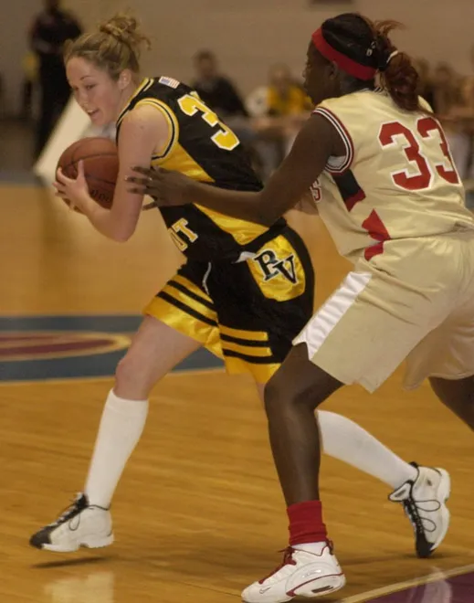 Bishop Verot's Christen Spake is checked by Pace's Jamie Skinner.